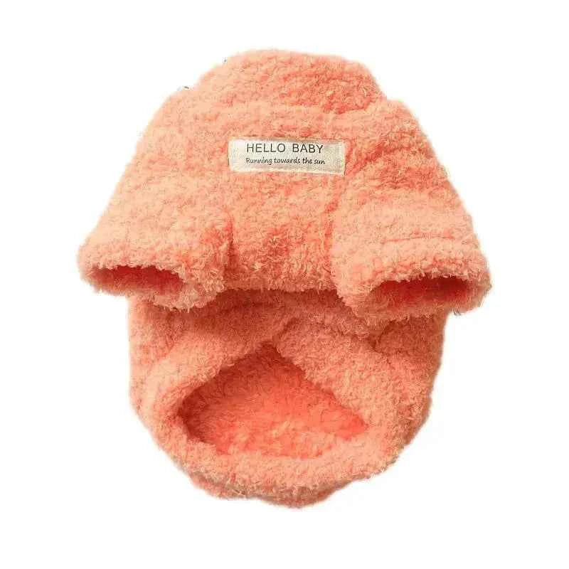 plush winter coat for dogs in soft coral fleece with insulated and water-resistant design