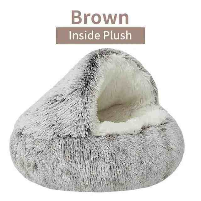 Soft plush pet bed with ultra-plush fabric and raised edges for cozy burrowing and security, machine washable brown color