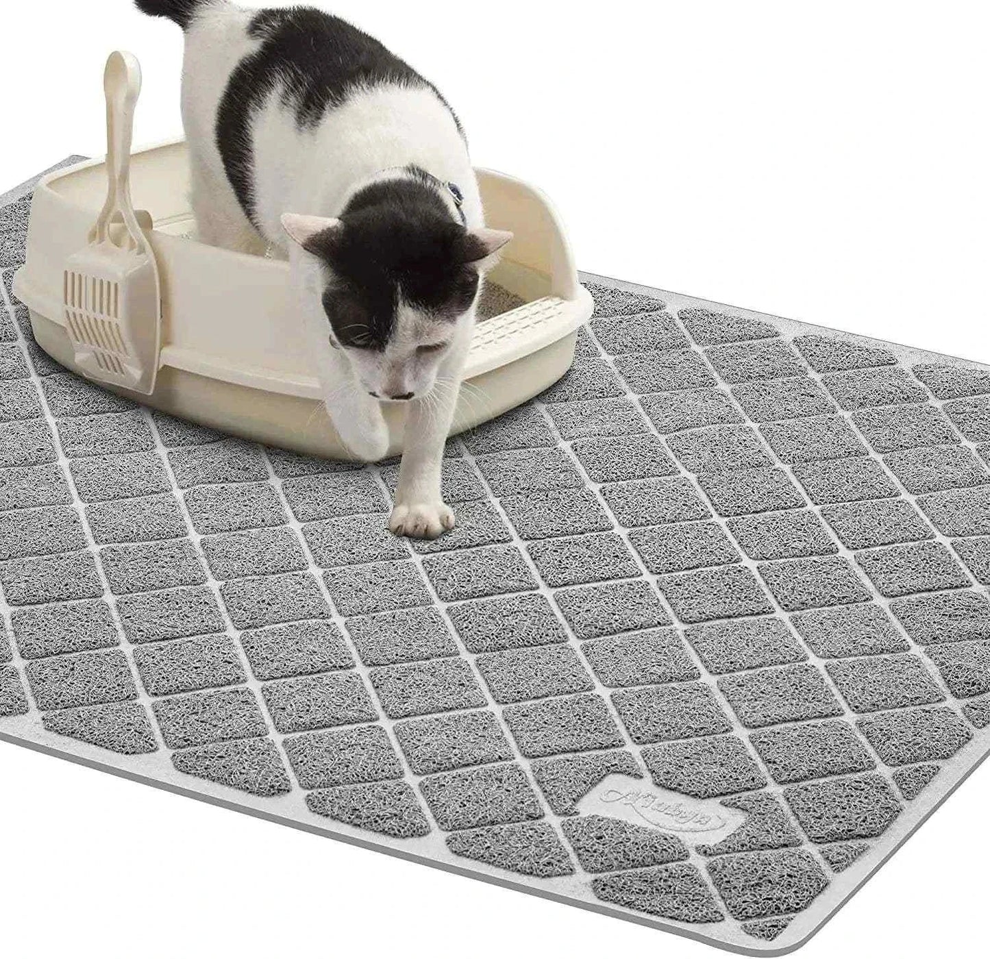Premium non-slip cat litter mat with textured surface and a cat stepping out of a litter box on it