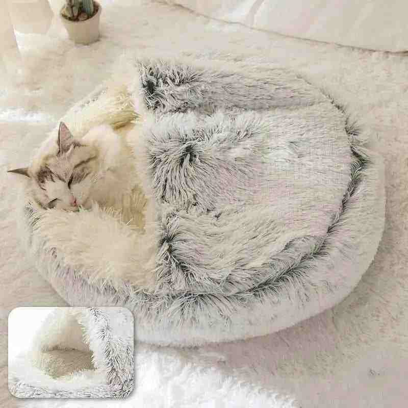 Soft Plush Pet Bed with ultra-plush fabric and raised edges, perfect for pets who love to burrow, shown with a sleeping cat inside
