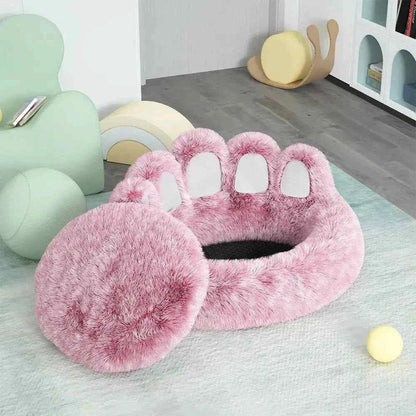 Long plush cat bed in pink faux fur with paw design, soft and cozy for cats to curl up and sleep comfortably