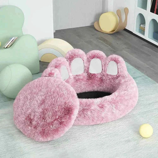 Long plush cat bed in pink faux fur with paw design, soft and cozy for cats to curl up and sleep comfortably