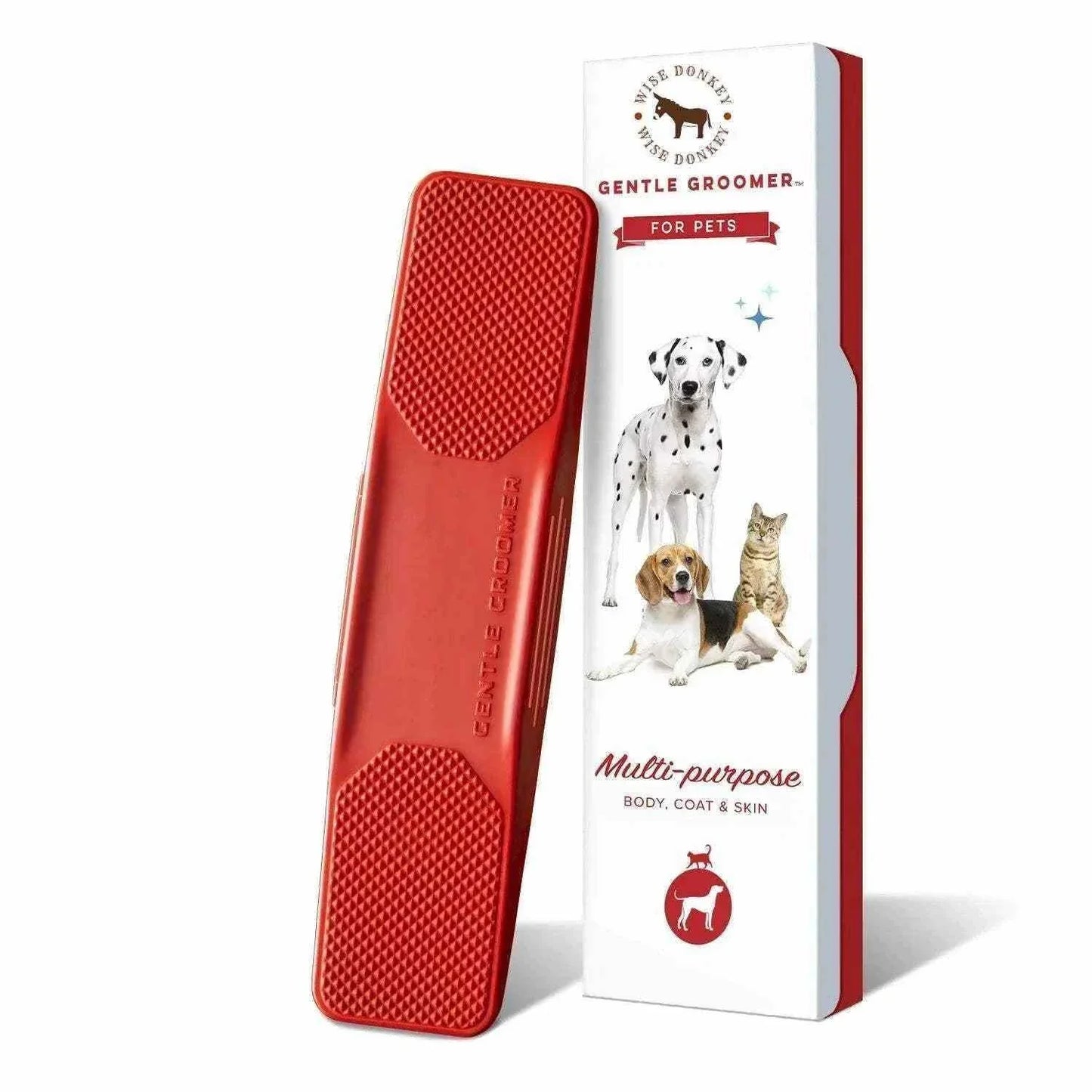 Pet Gentle Groomer brush with red bristles and ergonomic design next to white packaging featuring images of a dog, cat, and text highlighting gentle grooming for pets