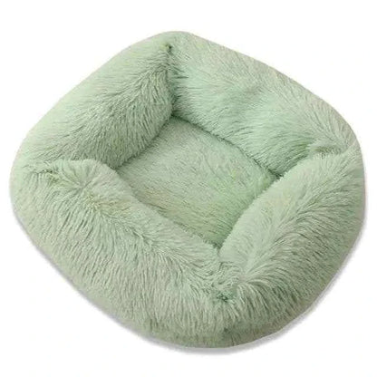 Cat sleeping on Plush Pet Bed with washable cover