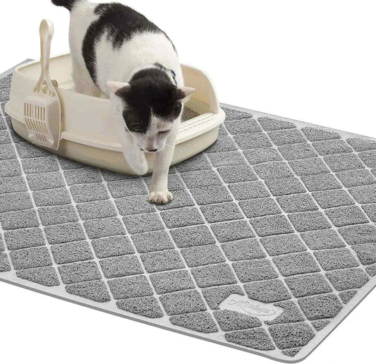 Premium non-slip cat litter mat with textured surface and a cat stepping out of a litter box on it