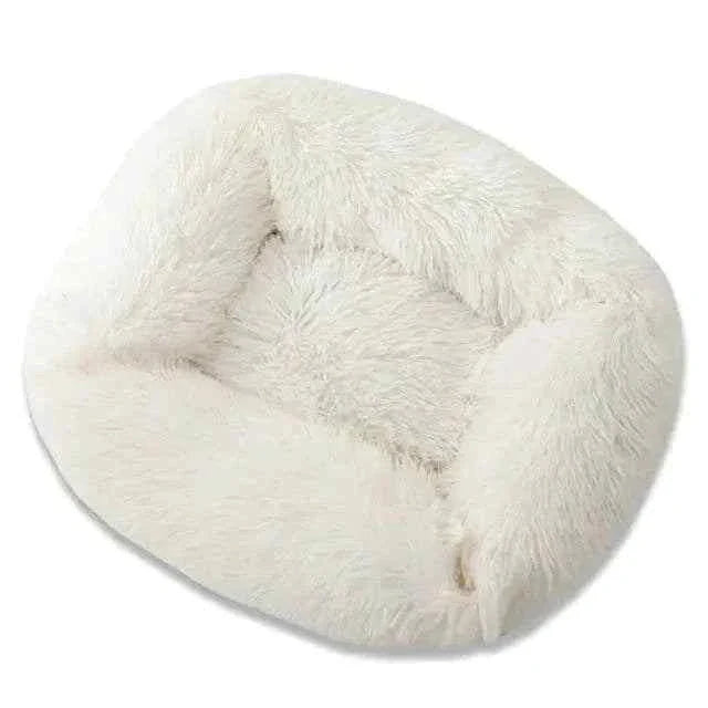 Dog resting comfortably on Plush Pet Bed, soft cushion